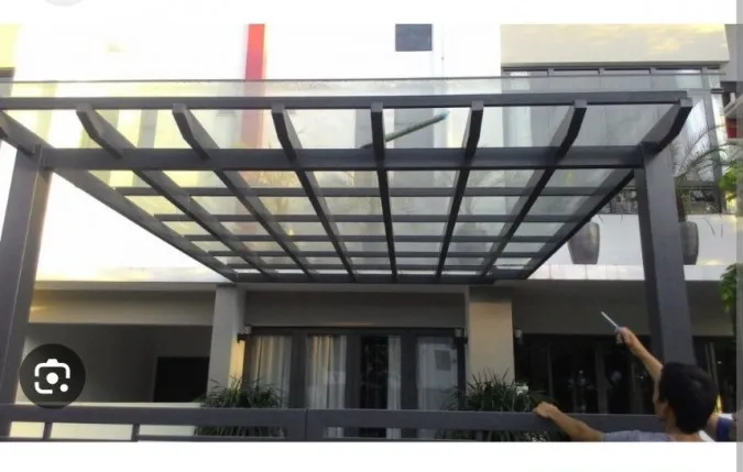 Mái che giếng trời bằng kính cường lực tại TPHCM - hình ảnh thực tế Mái che giếng trời cố định cho nhà phố